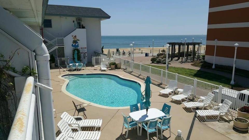 Unit is located on pool level.  In the picture it is on the left center.