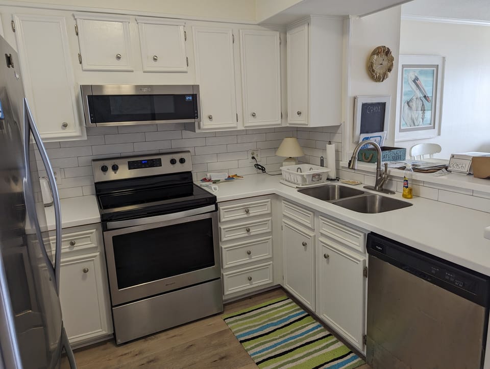 New counter, backsplash, flooring and sink/faucets 2024