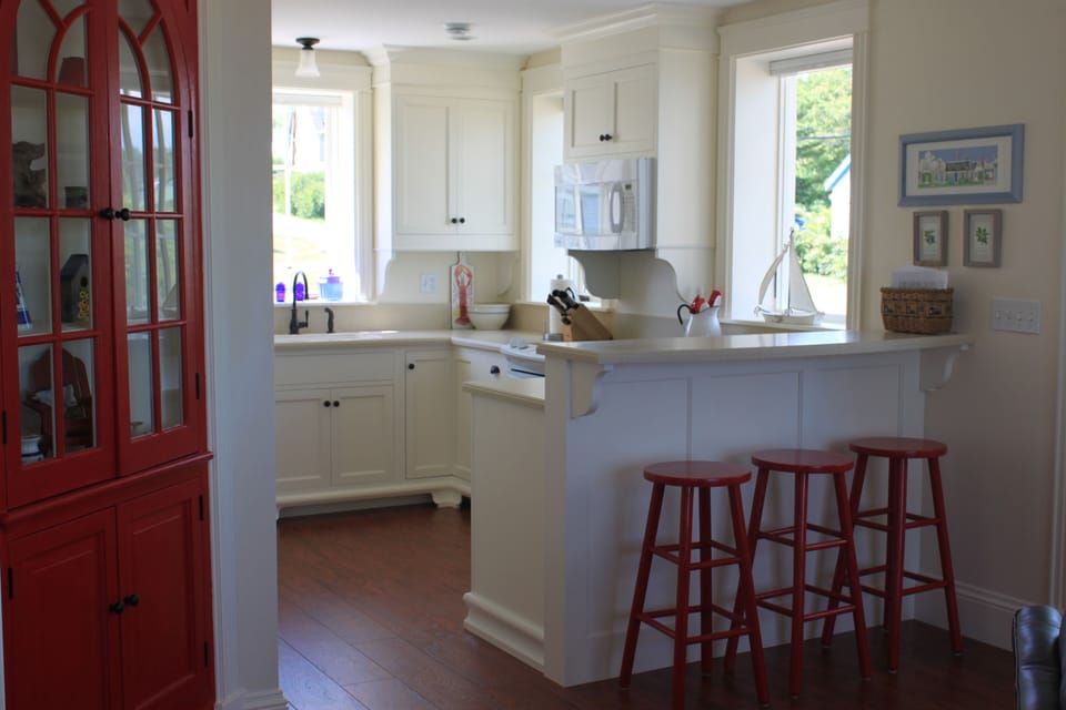 Well equipped kitchen with all new appliances and an eating bar. 