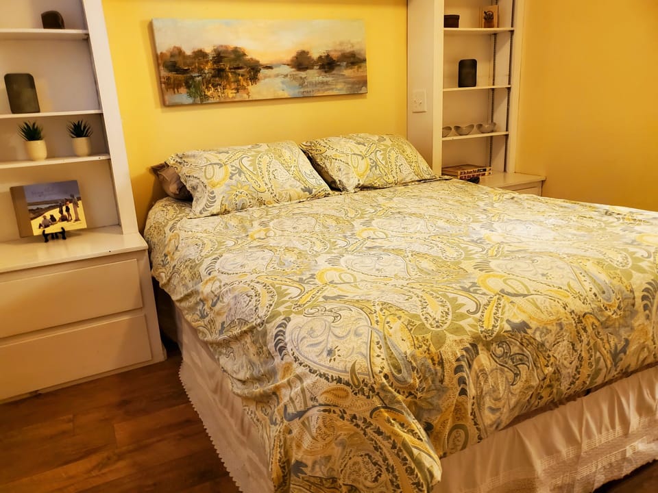 Downstairs bedroom queen bed