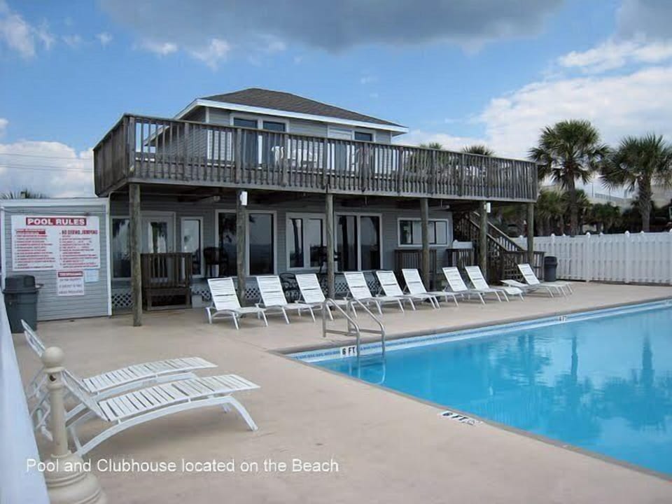 pool & clubhouse located on the beach