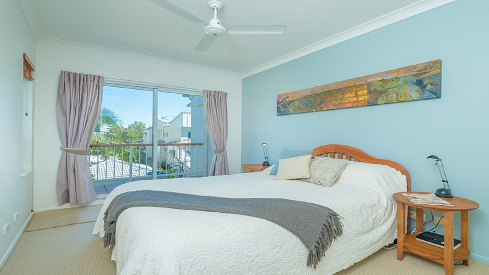 The master bedroom has a  high quality QSB, a balcony, en-suite and walk-in robe