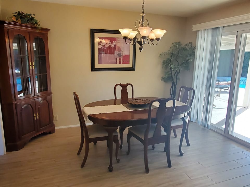 Dining area - Table w/extension leaves and 6 chairs.