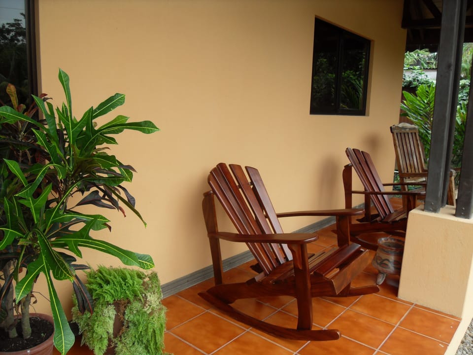 Enjoy your morning coffee, birds, butterflies and the sunset on the front porch 