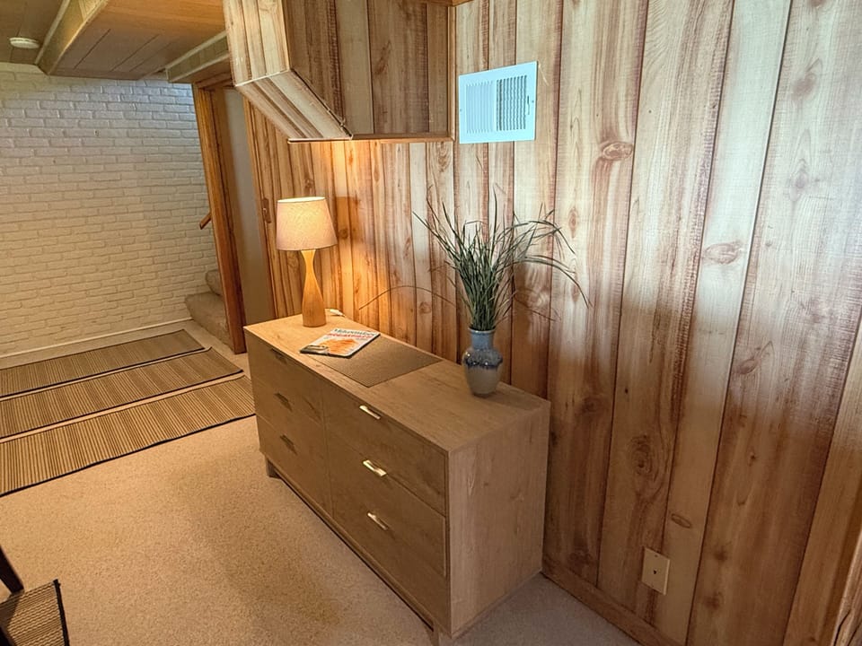 Chest of drawers with storage for sofa sleeper bedding