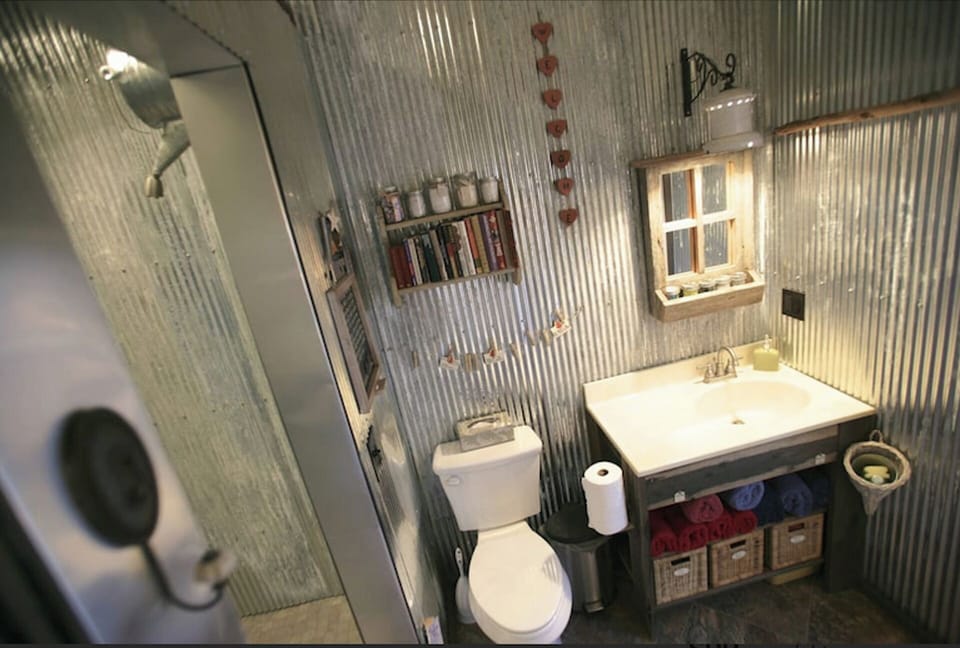 The only camping with towels, toiletries, flip-flops & wine glasses provided 