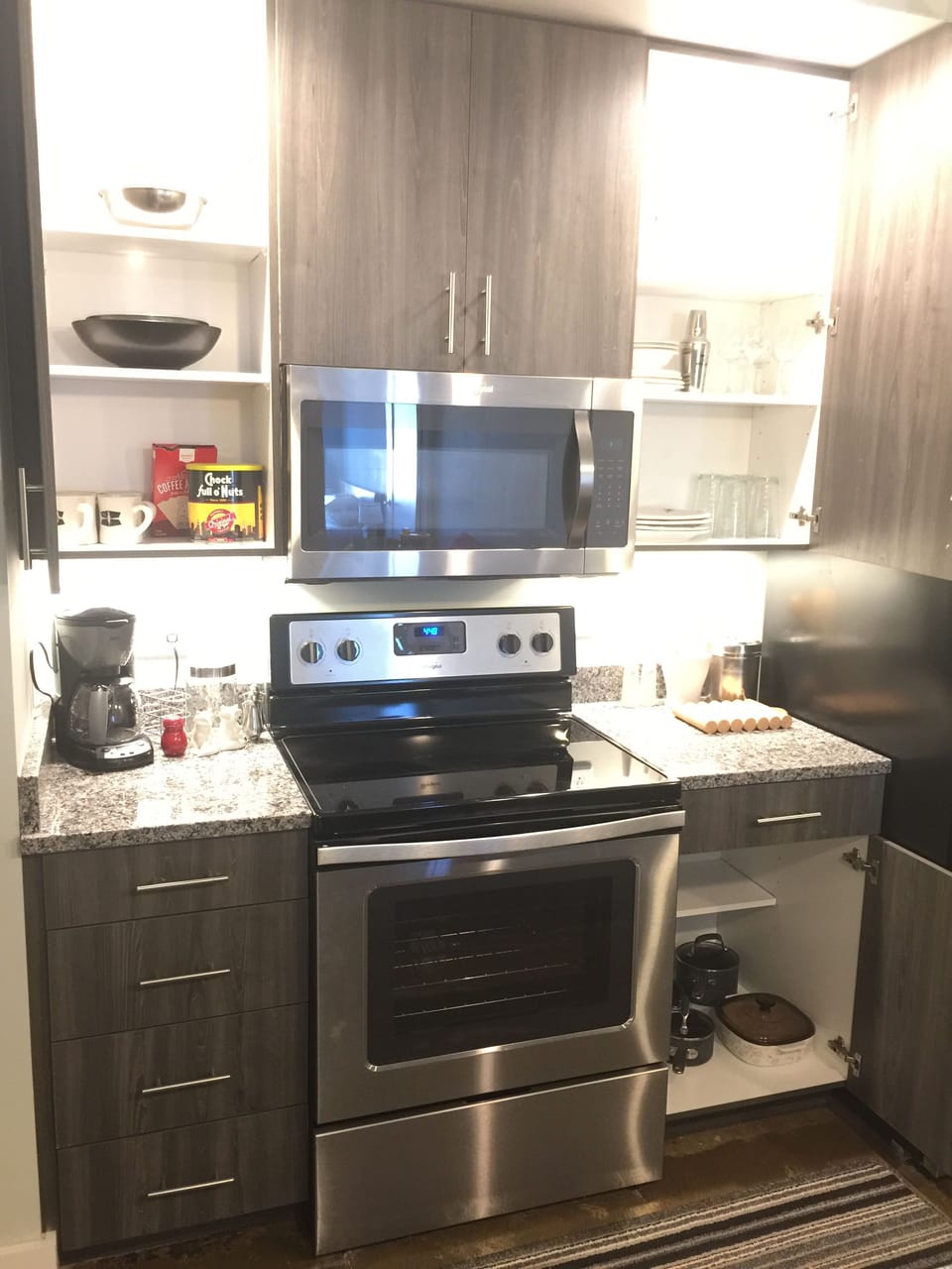 Fully equipped kitchen with coffee, filters, cooking oil, flour, salt & pepper. 