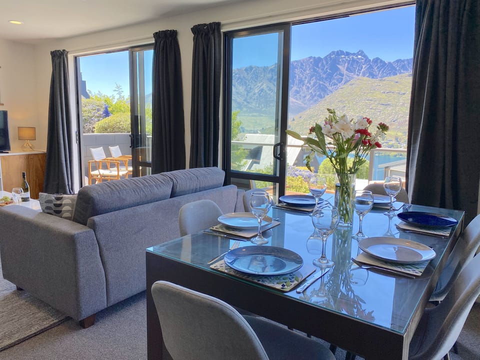 Dining table for six with Lake Wakatipu + Remarkables views (meals or games)