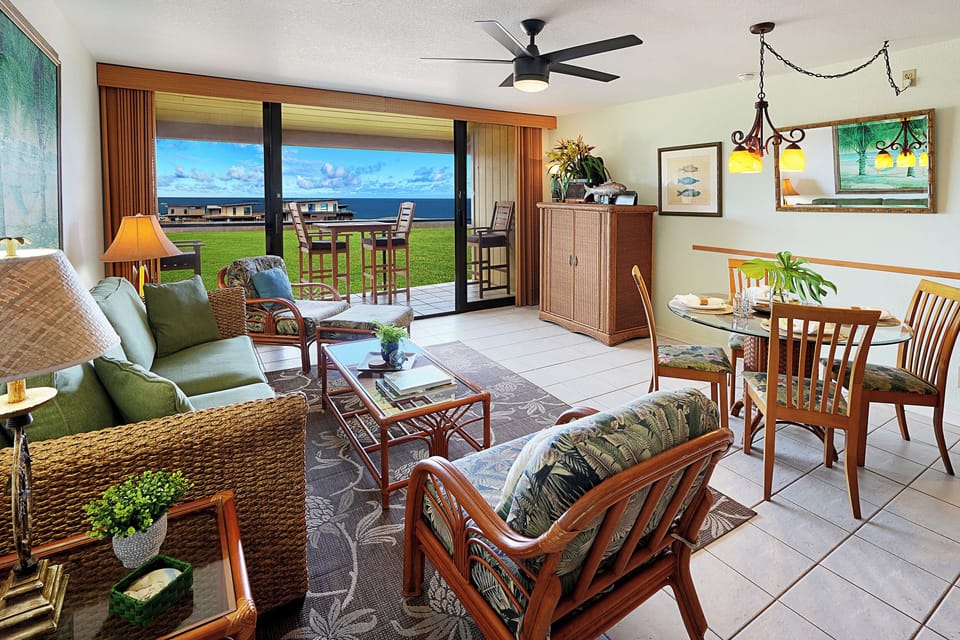 Living Room overlooking the balcony and ocean horizon.