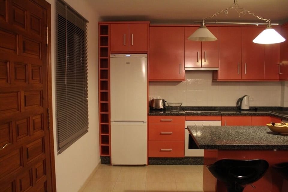 Well equipped kitchen with dish washer, stove, microvawe, and plenty of storage 