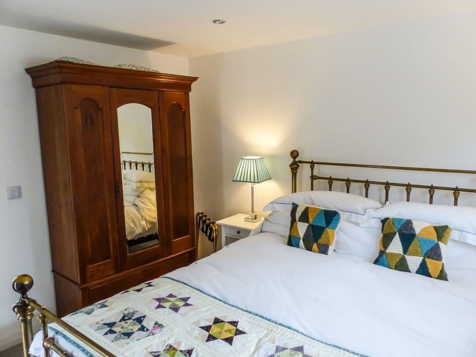 Bedroom with antique oak wardrobe. 