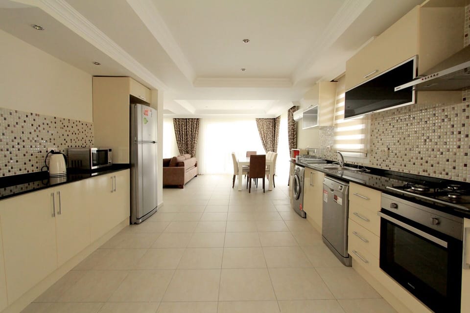spacious well equipped kitchen area 
