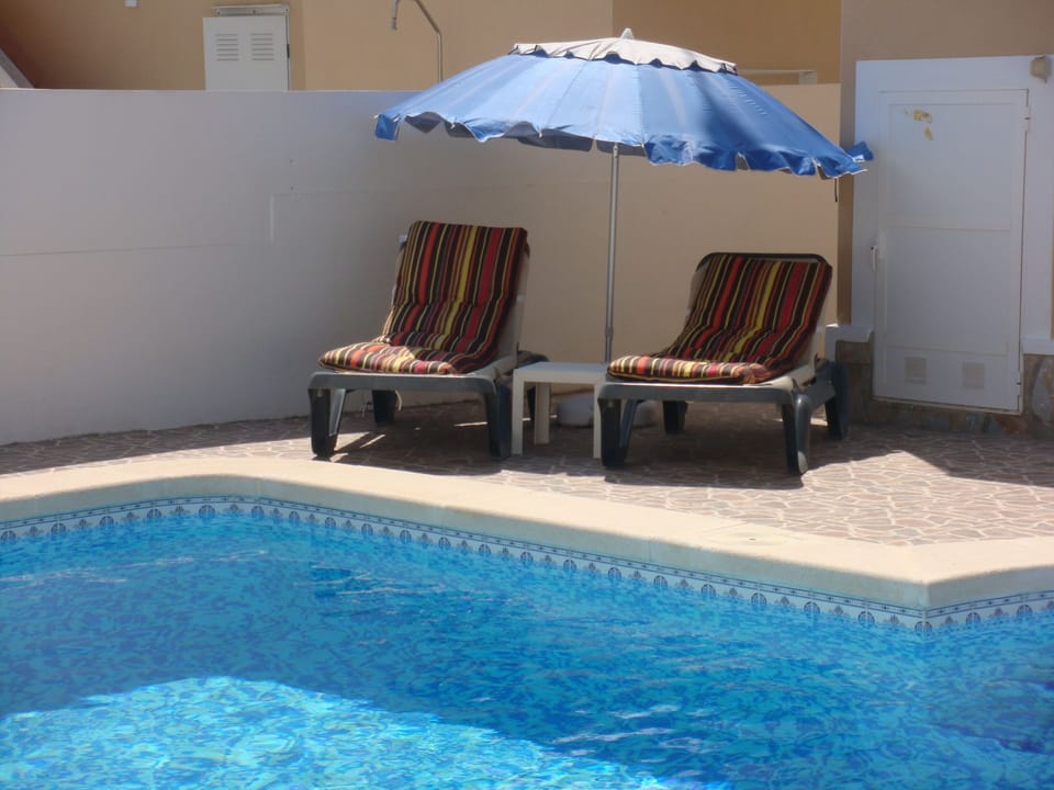 2 of 6 loungers round the pool