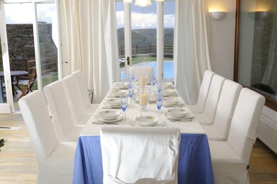 Dinner celebrations at the pool level of our luxury villa in Andros.