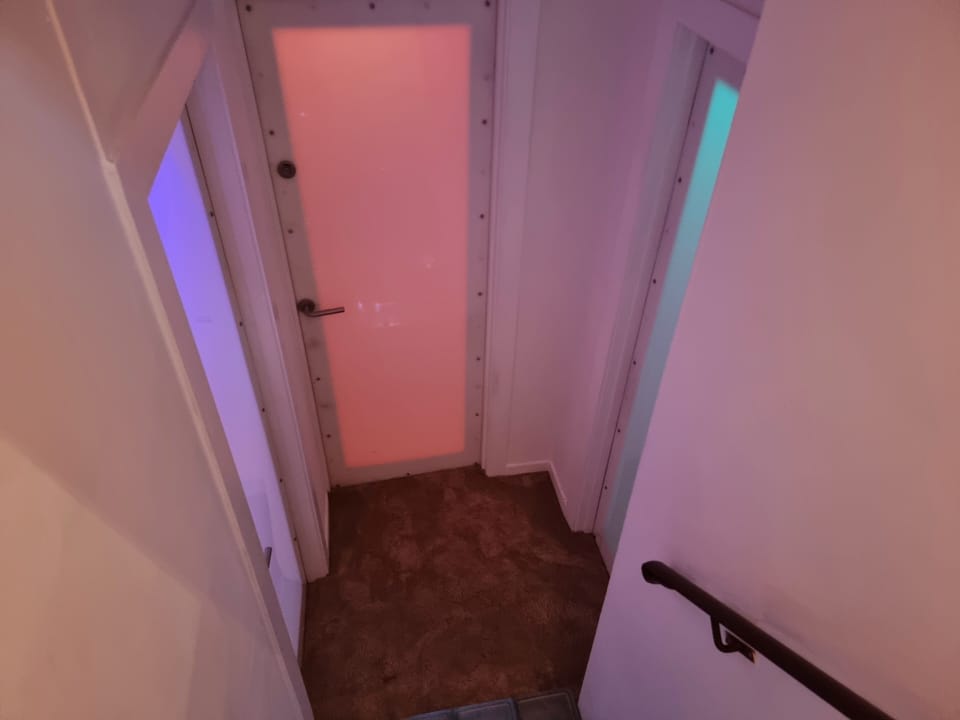 Doors  to garden room, bathroom and master bedroom. (lit up at night)