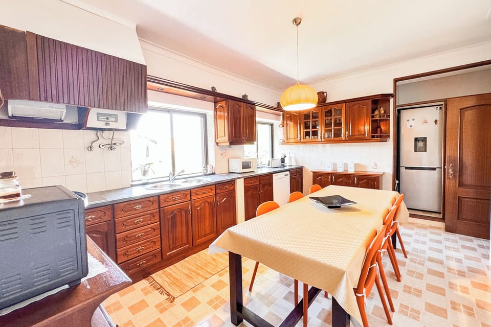 Kitchen fully equipped; fridge with cold water dispenser thinking of hot days