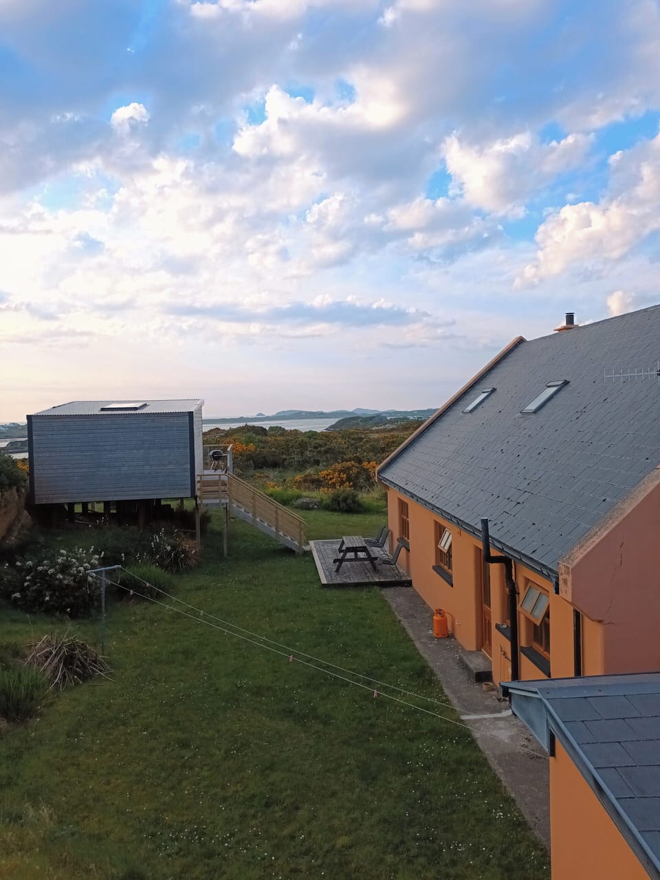 Back garden with Garden house and Strand view