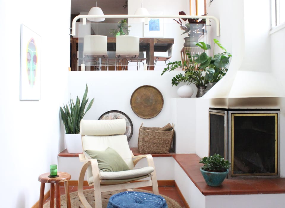 Cosy corner of the living room, with view to dining area beyond