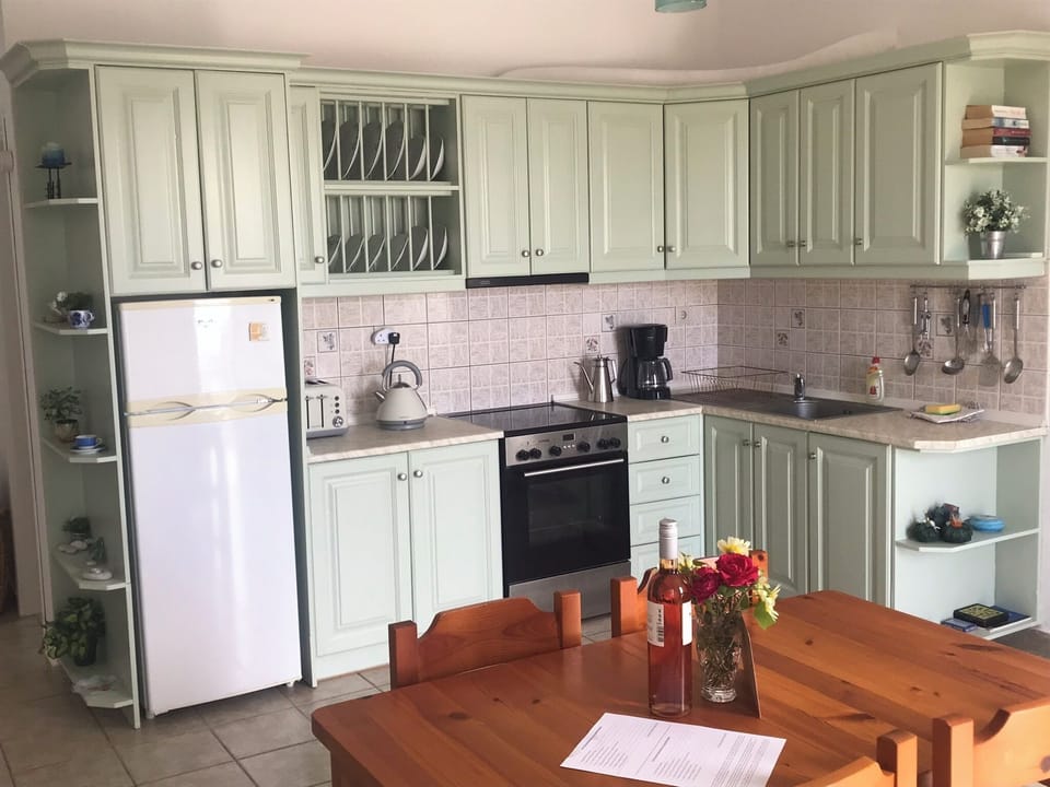 Villa Pefnos has a fully equipped kitchen and dining area.