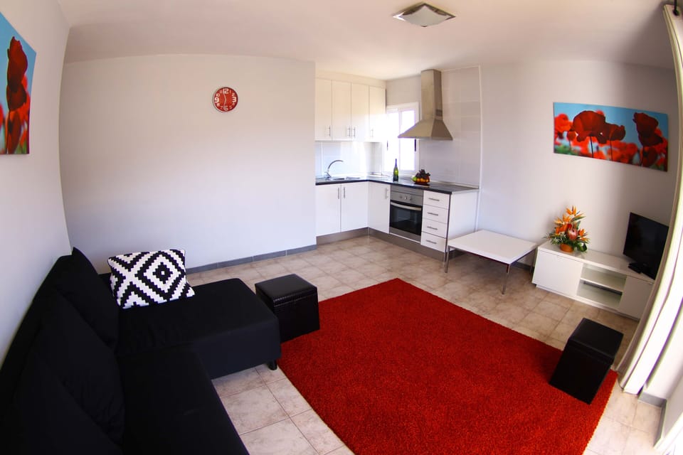 leaving room with open kitchen