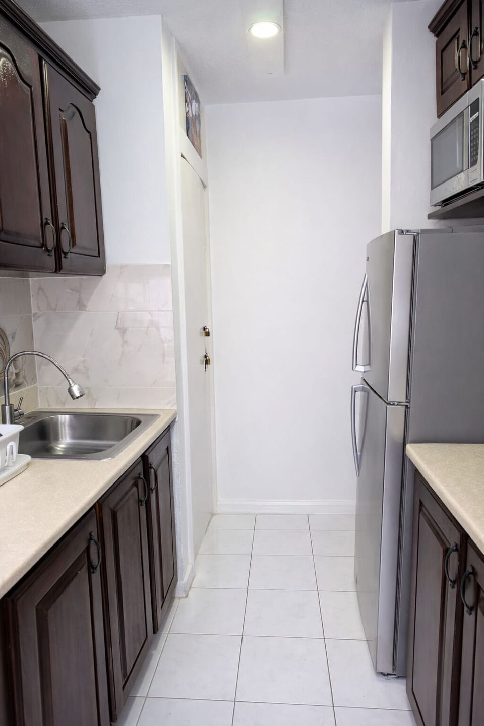 Clean, practical kitchen space with modern appliances and plenty of storage.