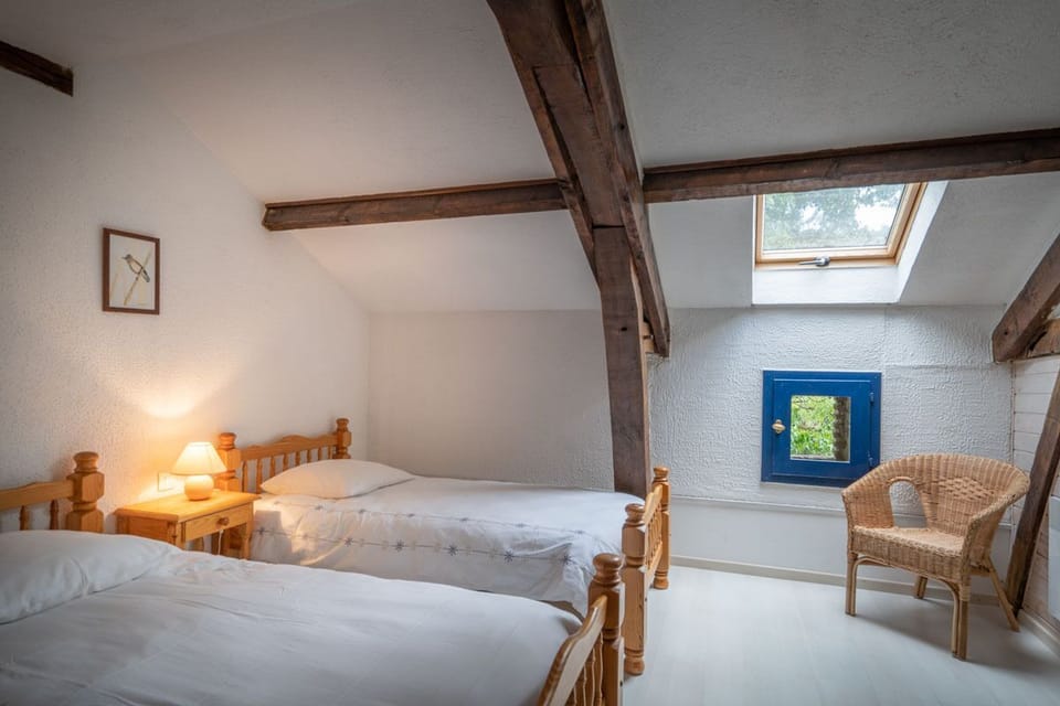 The single bedroom features solid pine furniture