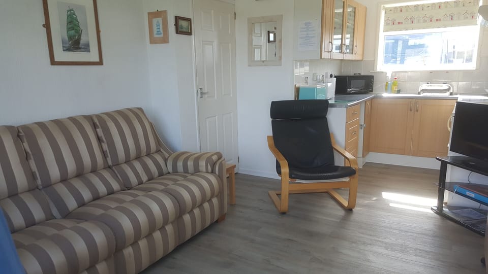 Open plan lounge with kitchen