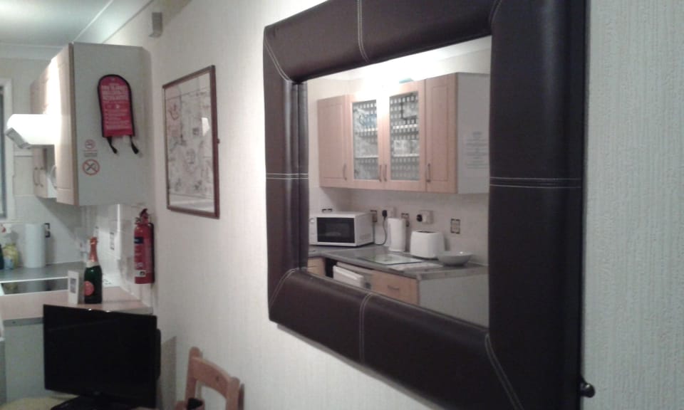 Open plan kitchen with lounge. 