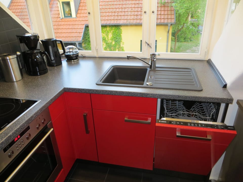 The kitchen is equipped with everything you may need to serve yourself at home