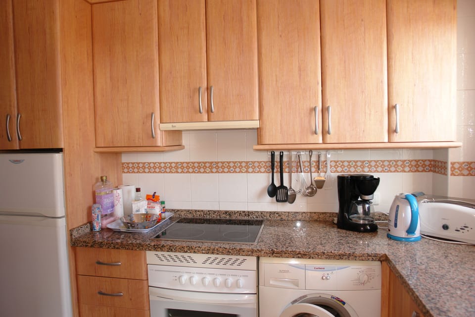 Carabeo 2000 2.3: Part of kitchen with access to the private terrace