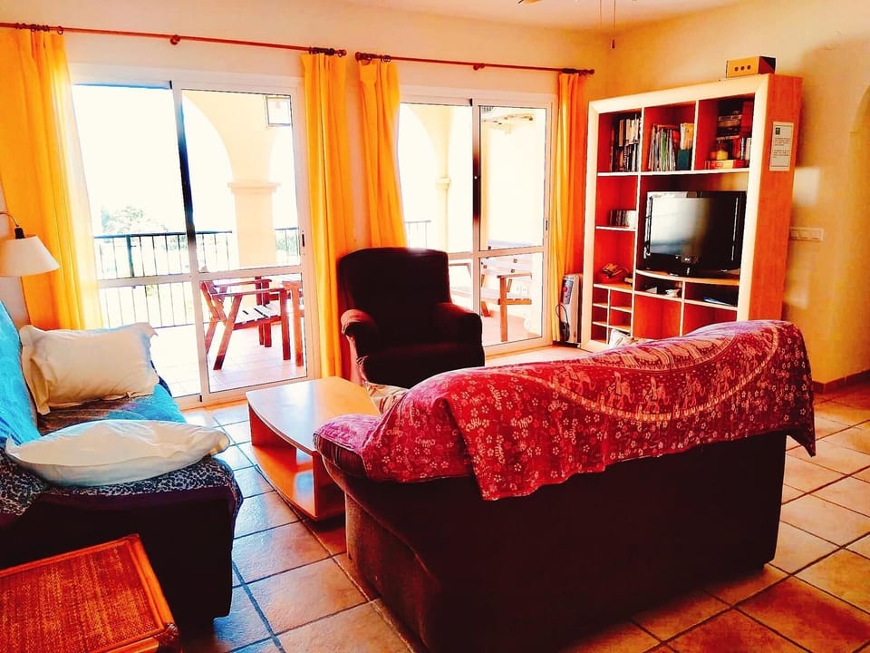 Living Room with grand terrace
El salon con la terraza grande