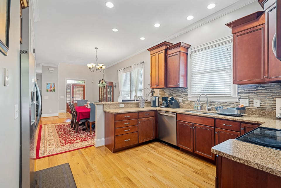 Full kitchen, equipped w/ coffee maker, blender, pots and pans, utensils, etc.
