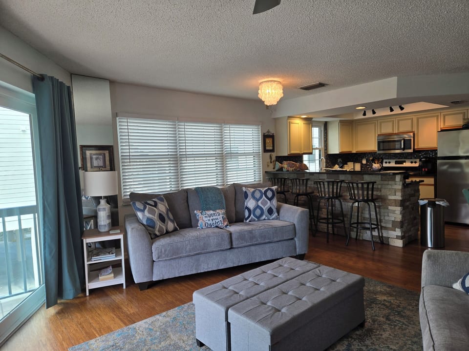 Open concept living, kitchen, dining space