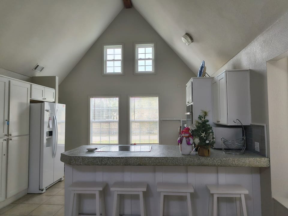 Living area to kitchen view.