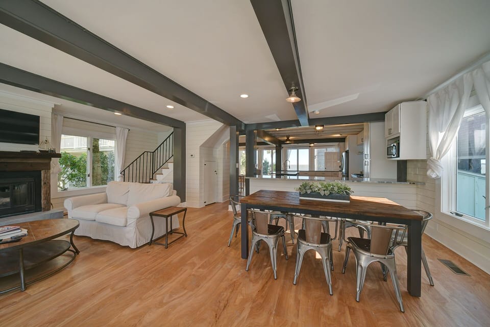 Open concept floor plan with views of the beach from the dining room, family room, kitchen, and 2 bedrooms