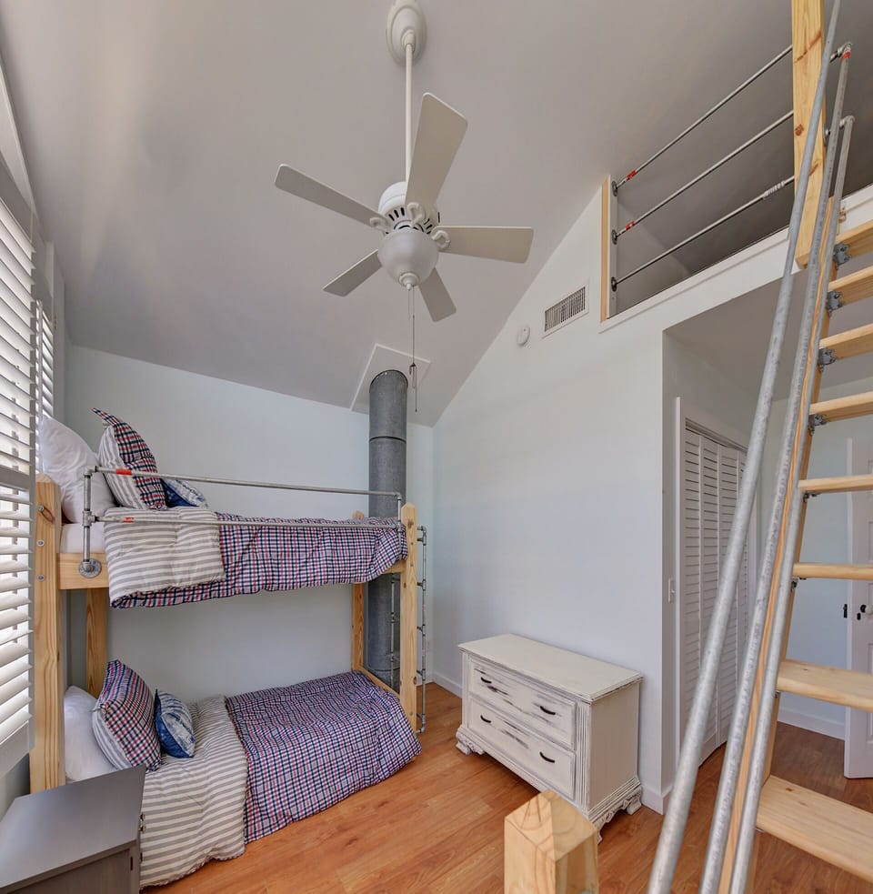 Crew's Quarters has twin beds plus a loft with 2 more beds for the kids