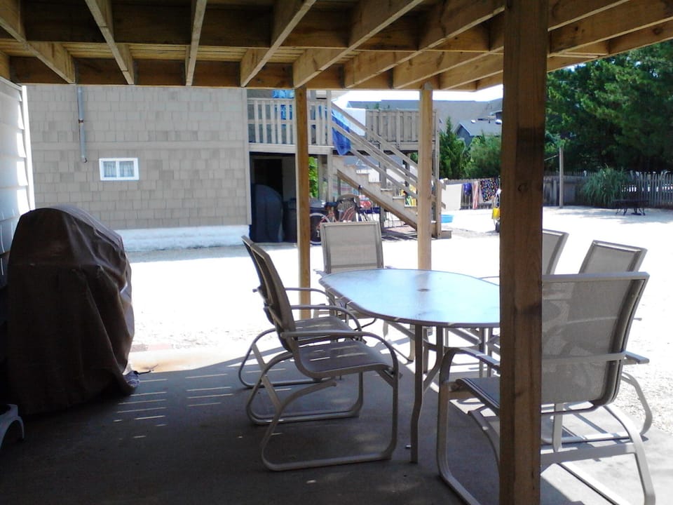 Patio with charcoal grill.