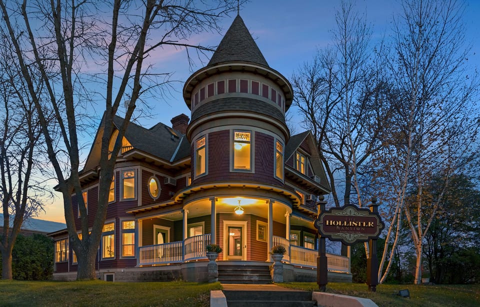 Queen Anne Victorian Mansion featuring wrap-around porch and regal entrance
