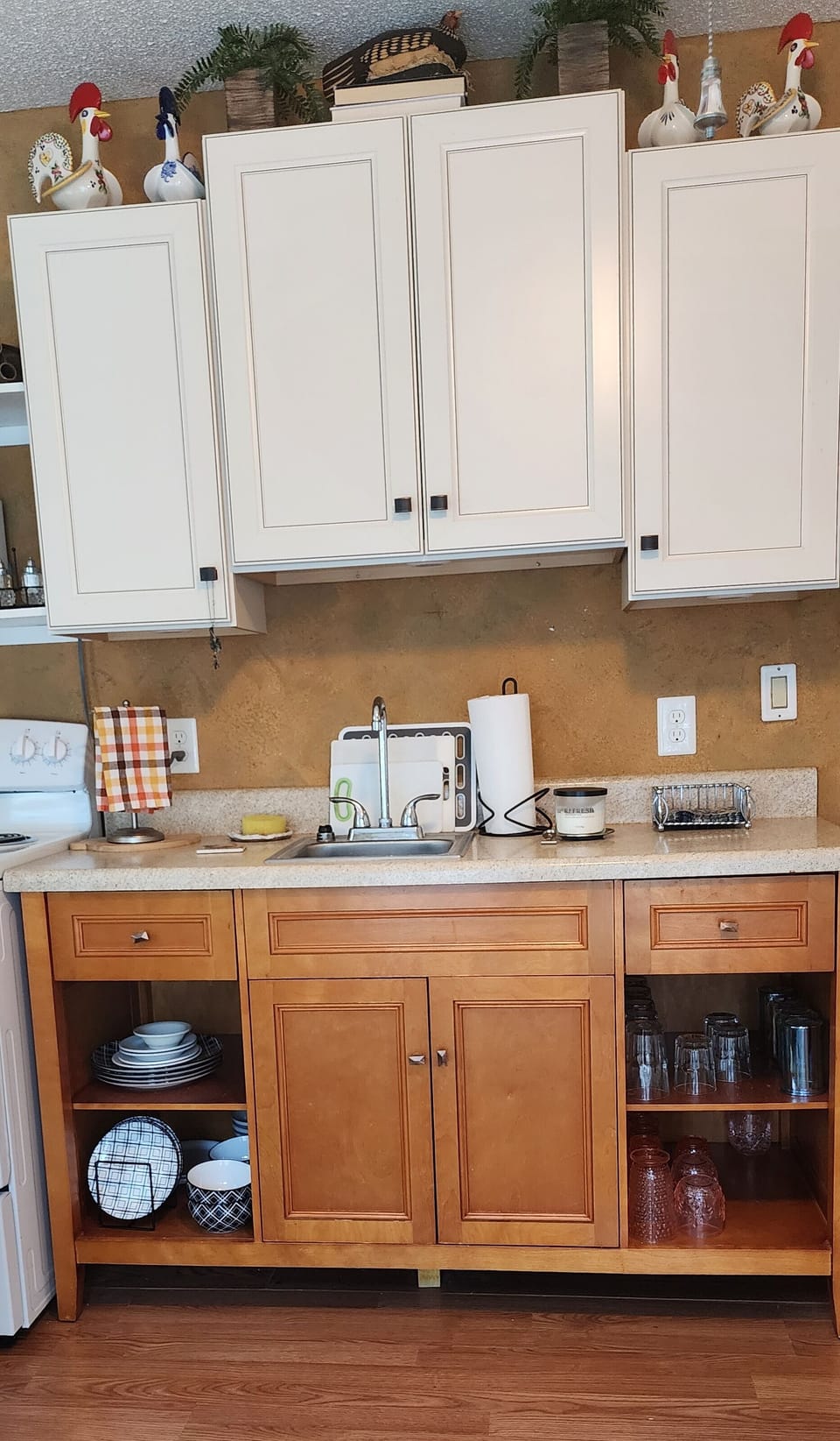 Kitchenette with upper & lower cabinets.  