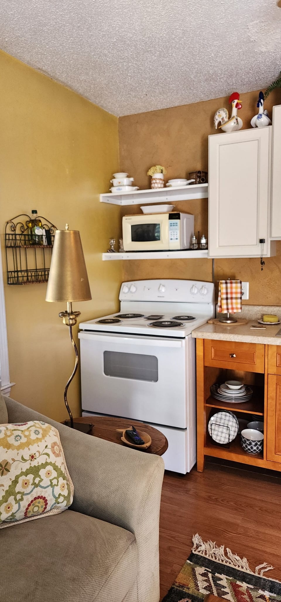 Kitchenette with full size stove & microwave