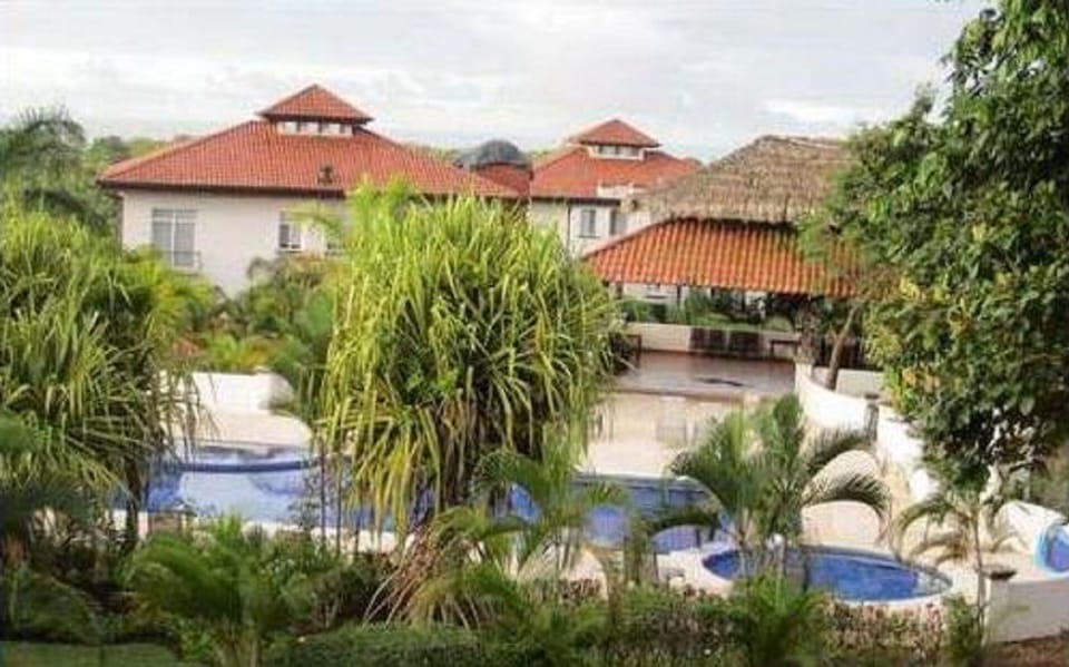 View of  Pool/Lanai complex from MBR Balcony of Casa Feliz.
