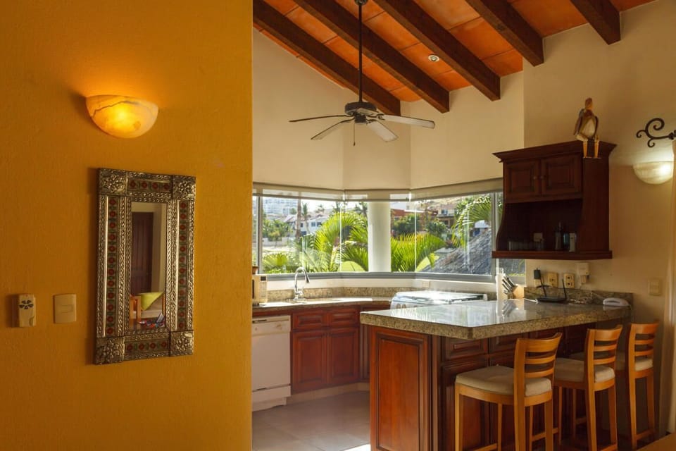 Your private unit and cornerless windows overlook the sparkling blue pool below