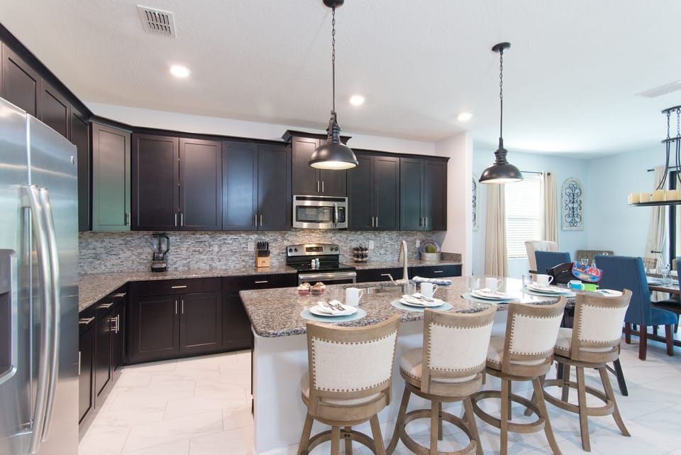 Kitchen with seating for 4 at big island