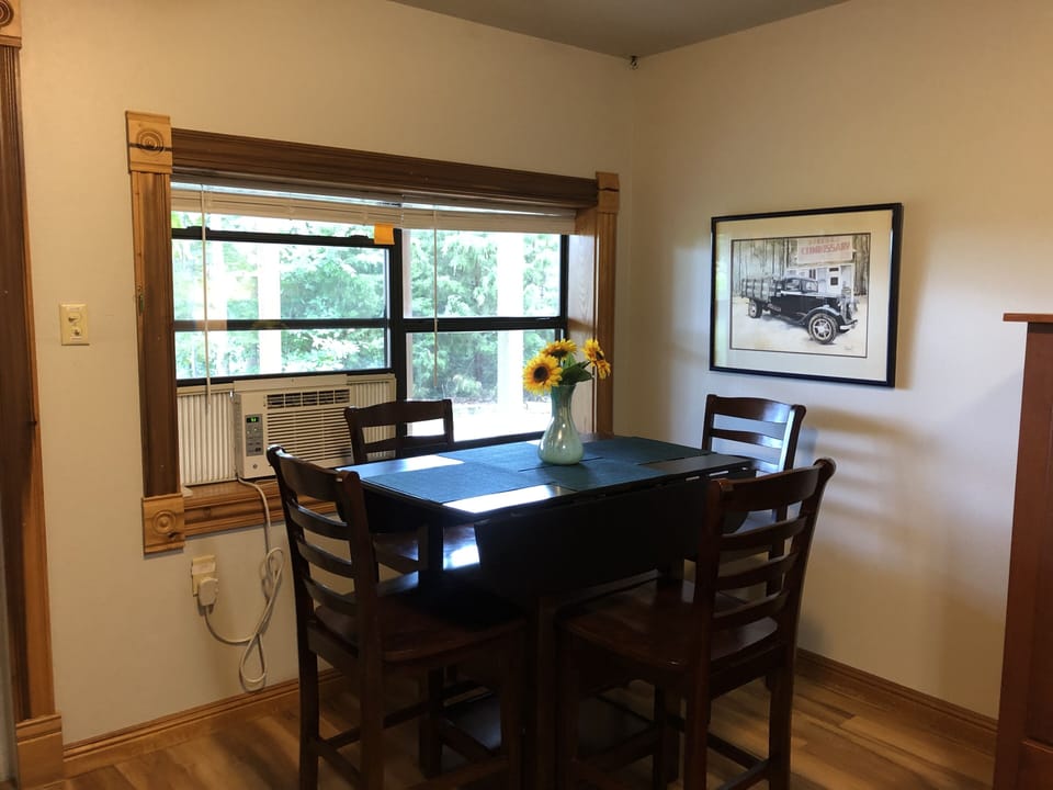 Downstairs is separate dining area or private workspace if needed