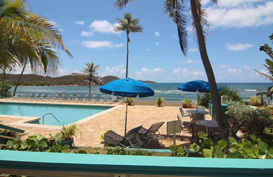 Direct walk out to tranquil oceanfront pool!