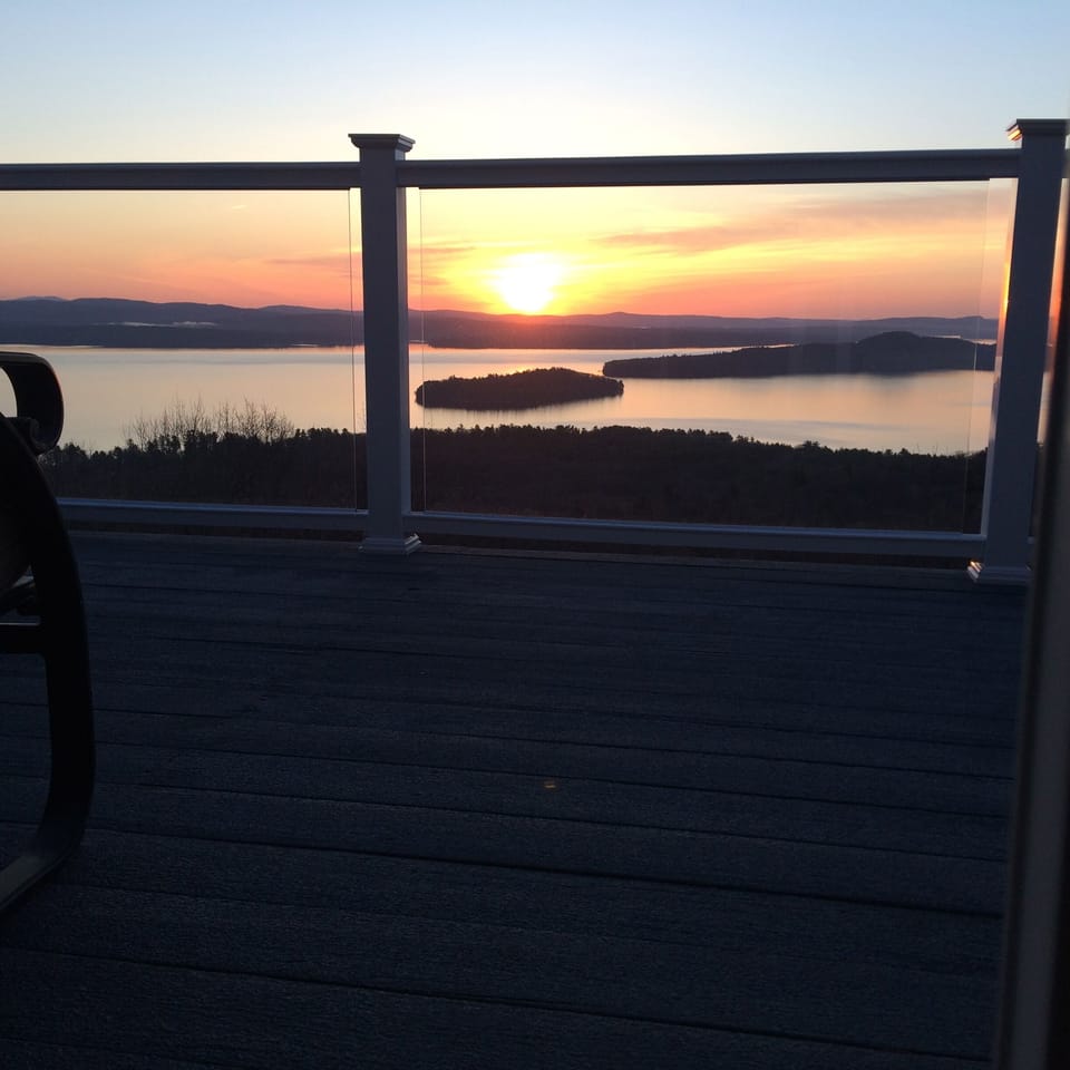 Summer sunrise  looking through glass deck panel