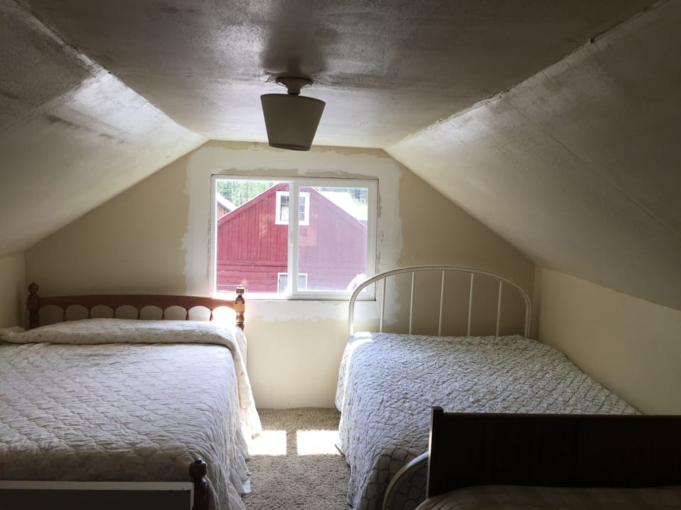 Upstairs has four full beds and 2 twin beds