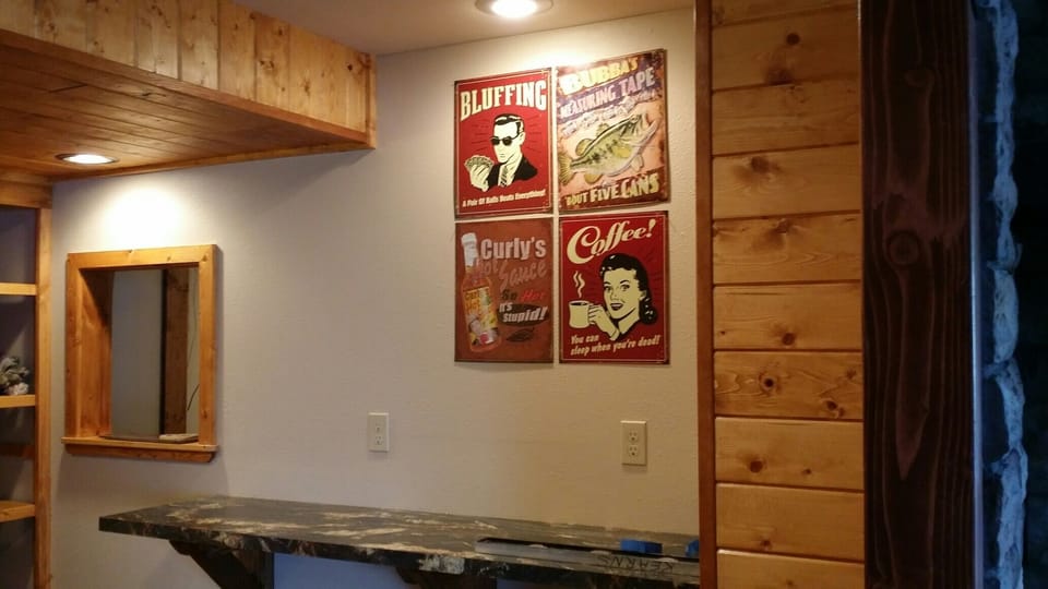 Serving window between pool room and entertainment room.
