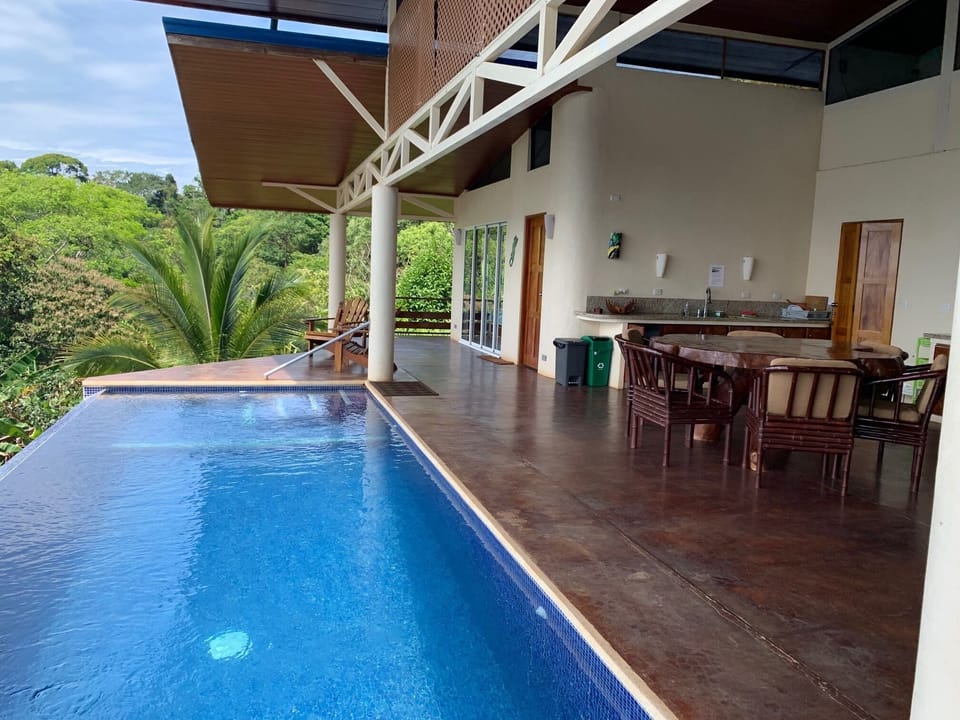 Bali-style. Wrap-around patios.