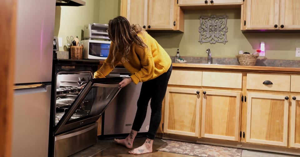 The kitchen is fully equipped with modern appliances, ample countertop space, and a well-stocked pantry, perfect for preparing delicious family meals.